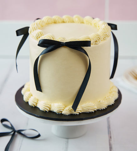 White and Black Ribbons and Ruffles Cake