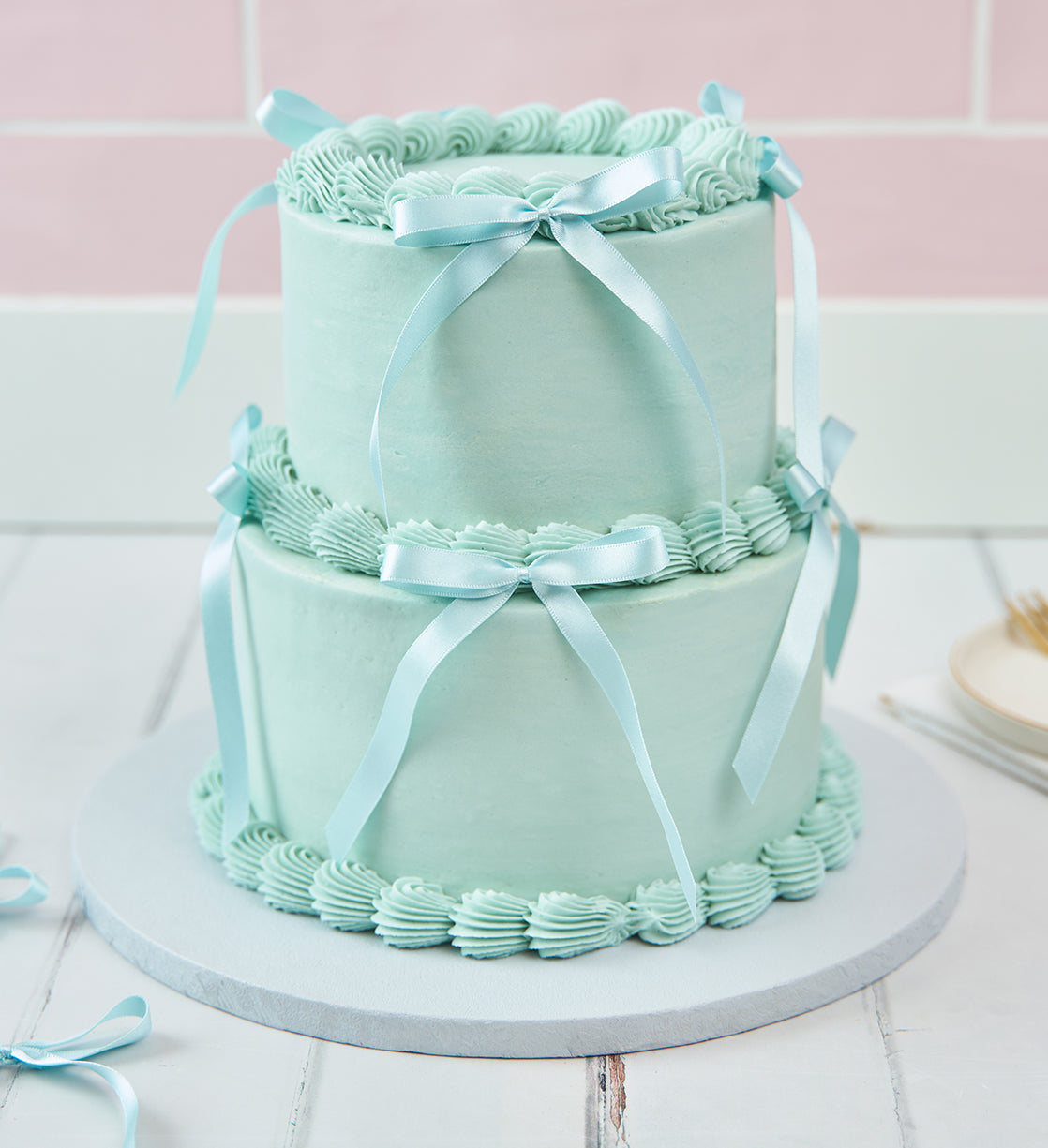 Blue Mini Two Tier Ribbons and Ruffles Cake