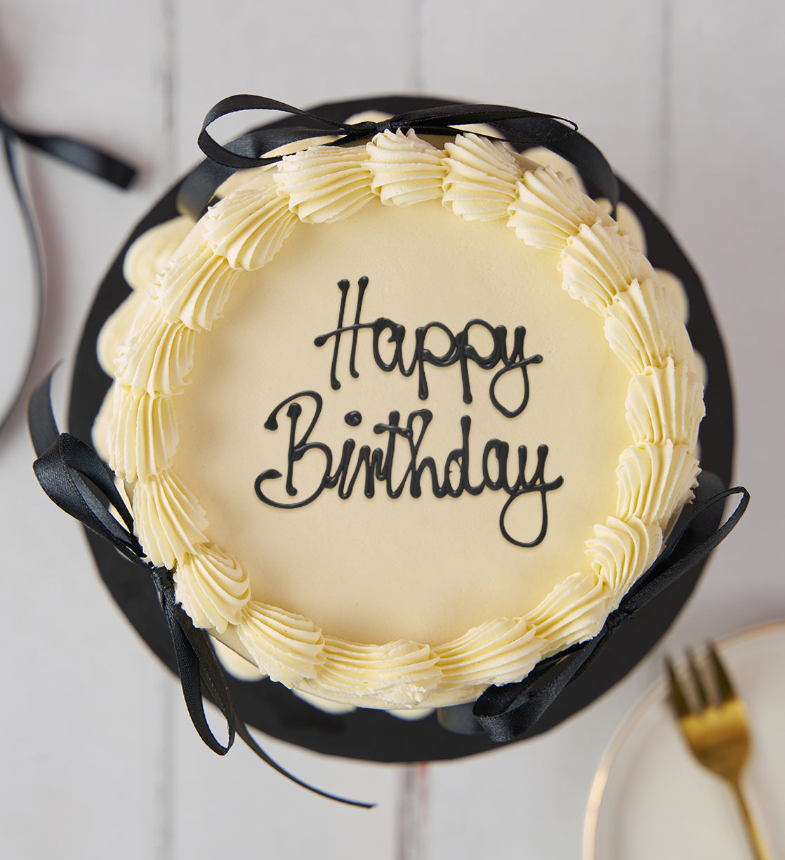 White and Black Ribbons and Ruffles Cake