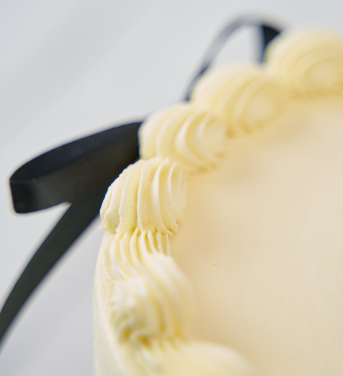 White and Black Ribbons and Ruffles Cake