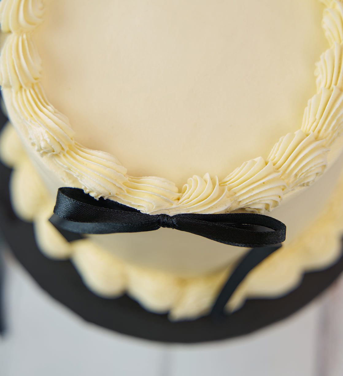 White and Black Ribbons and Ruffles Cake