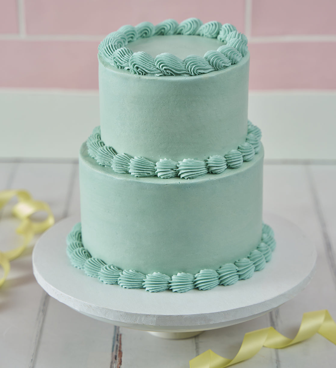 Blue Mini Two Tier Ribbons and Ruffles Cake